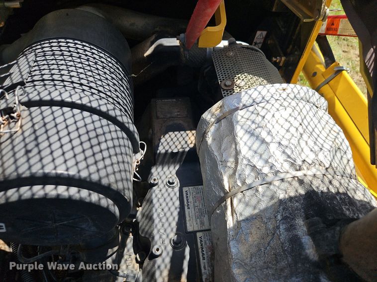 image for item EI3946 2009 Komatsu  SK1020-5N skid steer loader