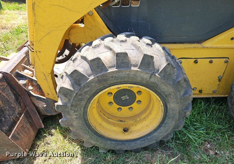 image for item EI3946 2009 Komatsu  SK1020-5N skid steer loader