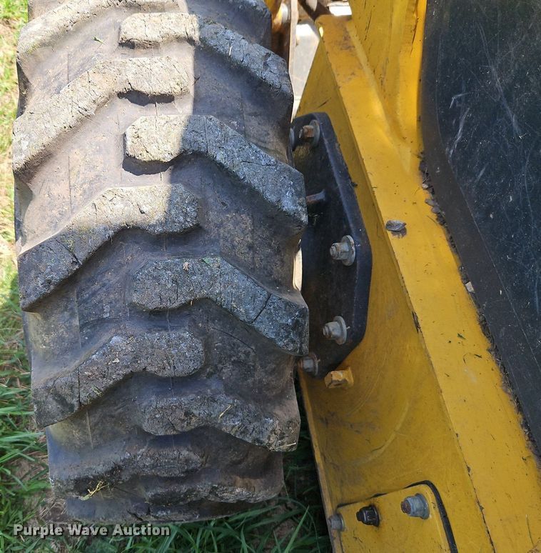 image for item EI3946 2009 Komatsu  SK1020-5N skid steer loader