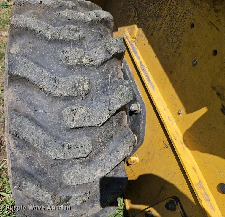 image for item EI3946 2009 Komatsu  SK1020-5N skid steer loader