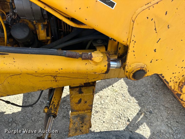 image for item EJ4368 1992 John Deere  310D backhoe
