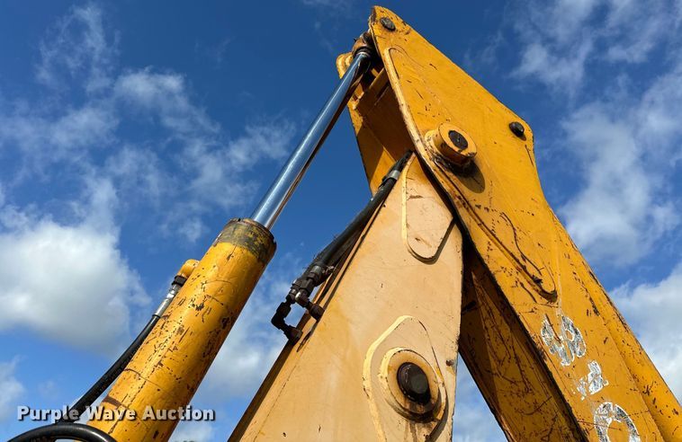 image for item EJ4368 1992 John Deere  310D backhoe