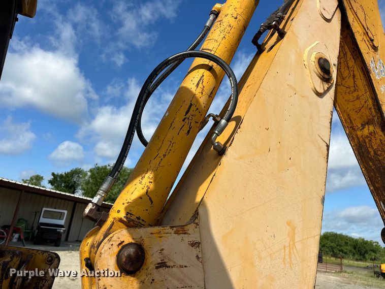 image for item EJ4368 1992 John Deere  310D backhoe
