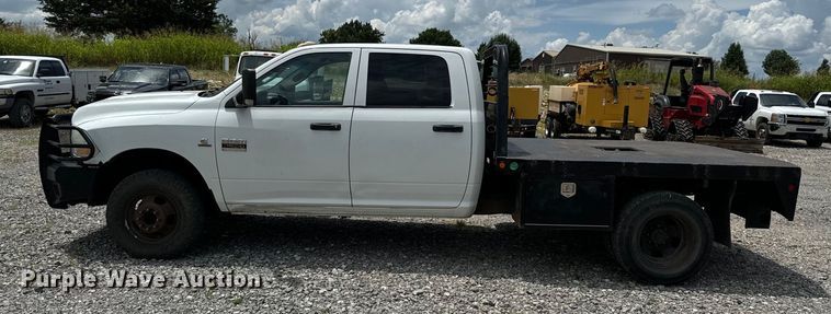 image for item NQ9607 2012 Dodge Ram 3500 Crew Cab flatbed pickup truck