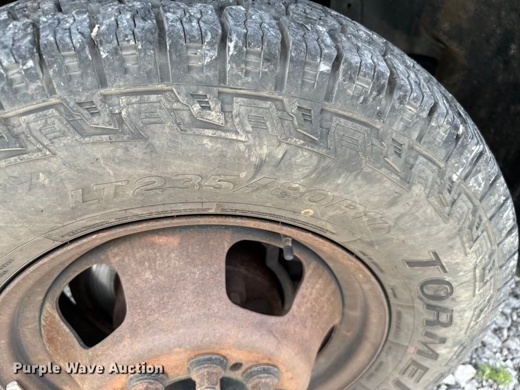 image for item NQ9607 2012 Dodge Ram 3500 Crew Cab flatbed pickup truck