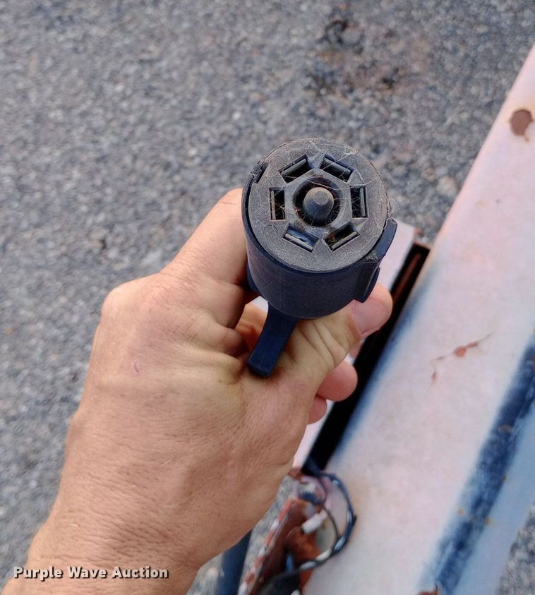 image for item DP1065 1989 Charles Machine Works, Inc. tilt deck equipment trailer