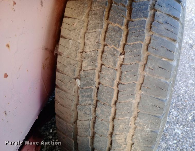 image for item DP1065 1989 Charles Machine Works, Inc. tilt deck equipment trailer