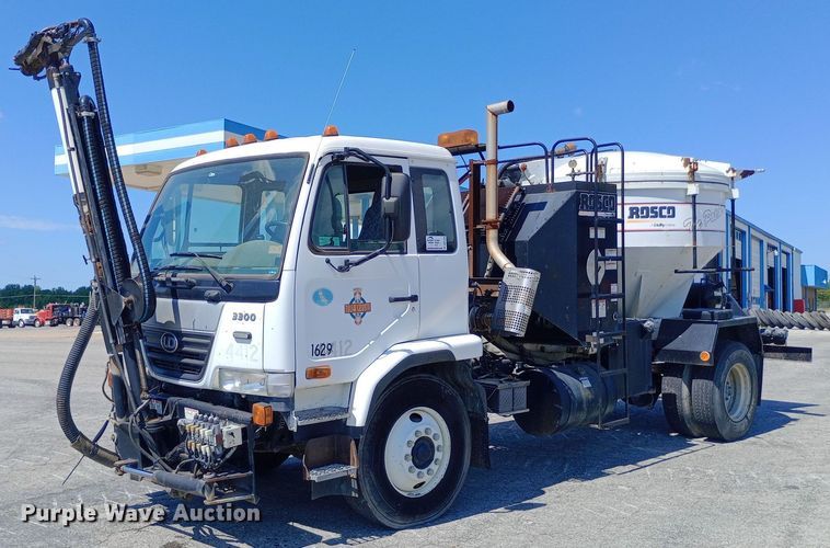 image for item DP1139 2009 Nissan 3500 Rosco Pro Patcher pothole patcher truck