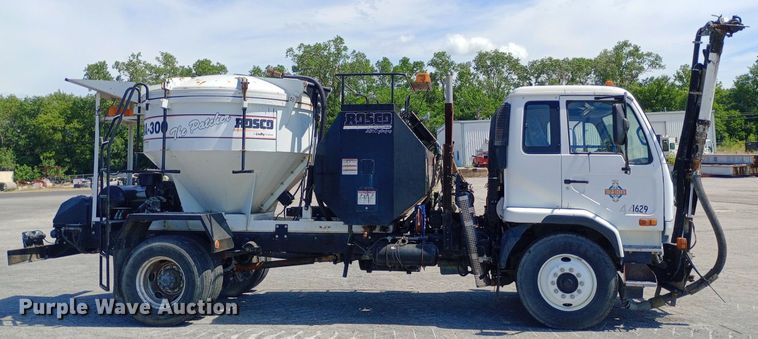 image for item DP1139 2009 Nissan 3500 Rosco Pro Patcher pothole patcher truck