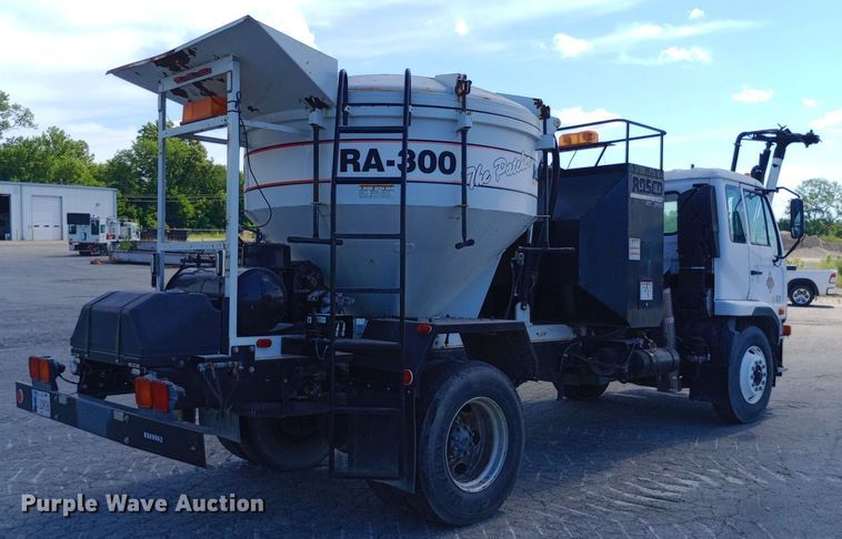 image for item DP1139 2009 Nissan 3500 Rosco Pro Patcher pothole patcher truck