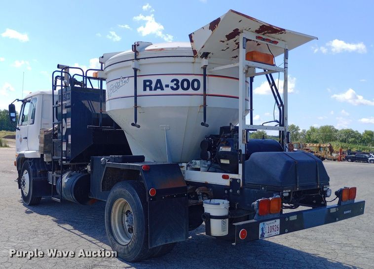 image for item DP1139 2009 Nissan 3500 Rosco Pro Patcher pothole patcher truck