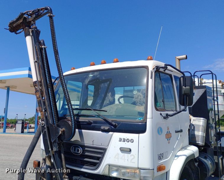 image for item DP1139 2009 Nissan 3500 Rosco Pro Patcher pothole patcher truck