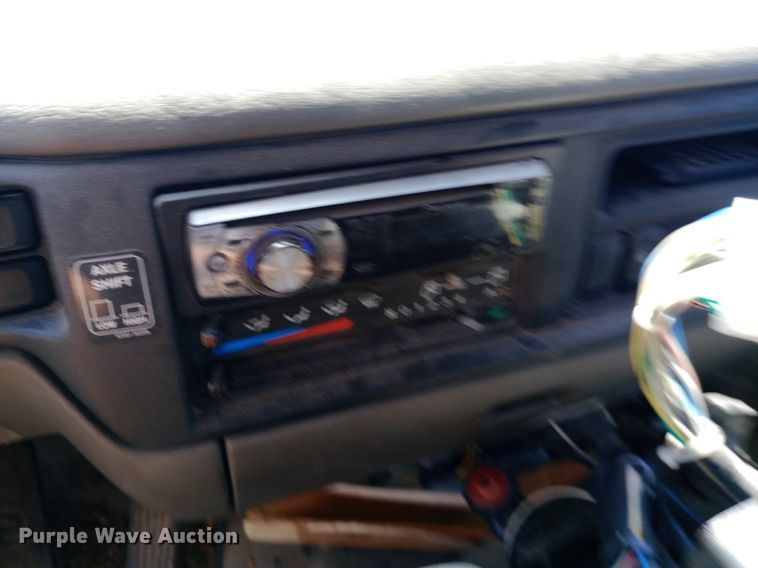 image for item DP1139 2009 Nissan 3500 Rosco Pro Patcher pothole patcher truck