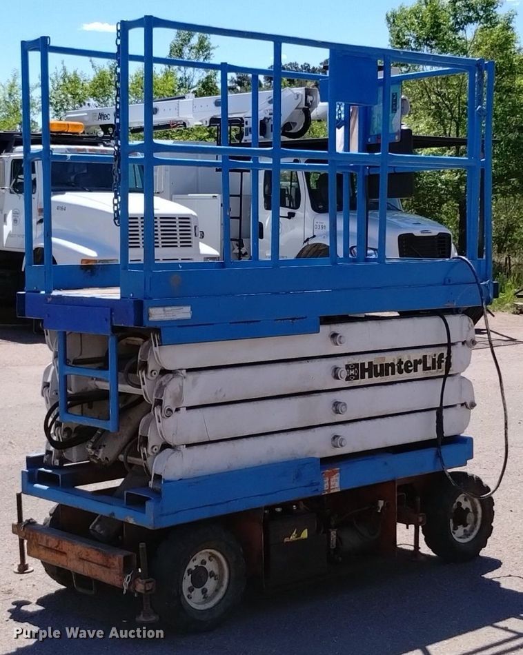 image for item DQ6150 1985 HunterLift 2152 scissor lift