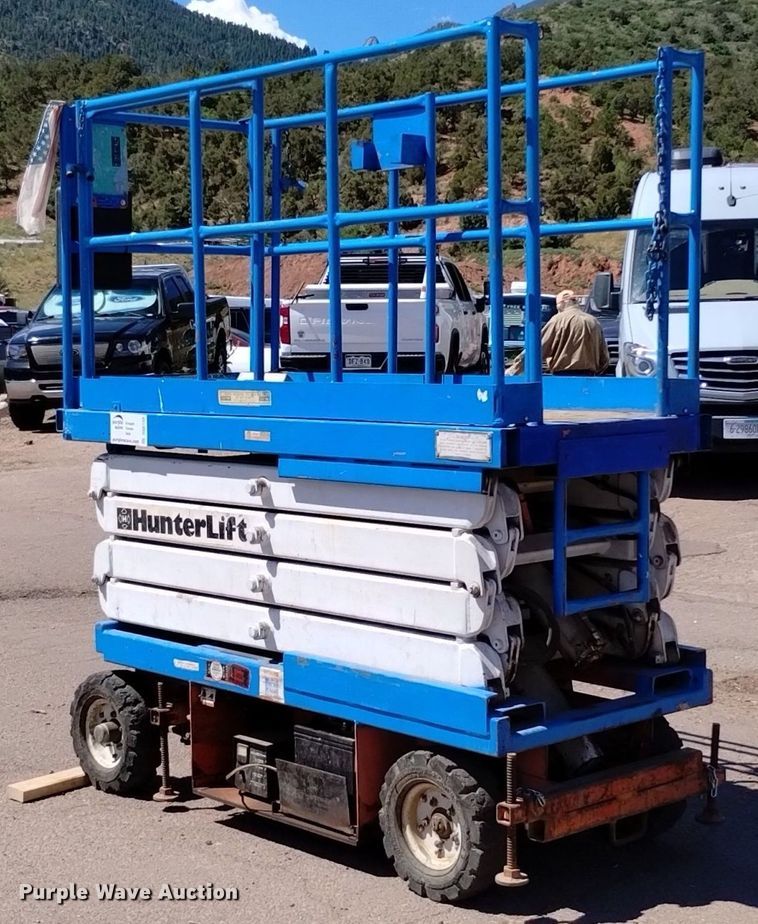 image for item DQ6150 1985 HunterLift 2152 scissor lift