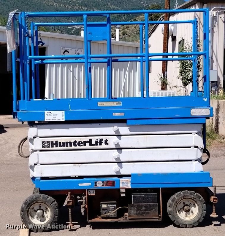 image for item DQ6150 1985 HunterLift 2152 scissor lift