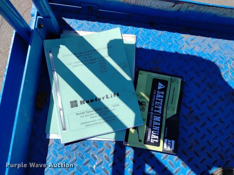 image for item DQ6150 1985 HunterLift 2152 scissor lift