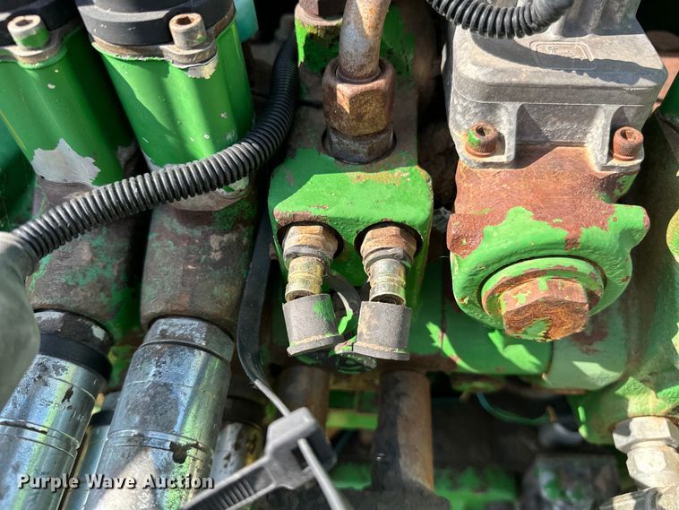 image for item NR9819 2004 John Deere 6420 MFWD tractor