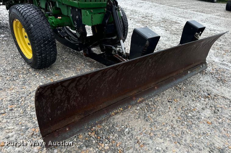 image for item OF9776 1994 John Deere 870 MFWD tractor