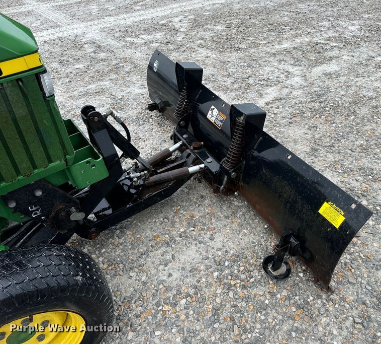 image for item OF9776 1994 John Deere 870 MFWD tractor