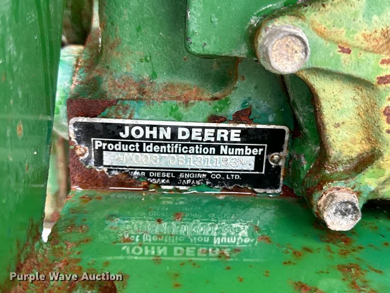image for item OF9776 1994 John Deere 870 MFWD tractor