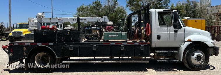 image for item DK6684 2013 International  DuraStar 4300 flatbed truck with crane