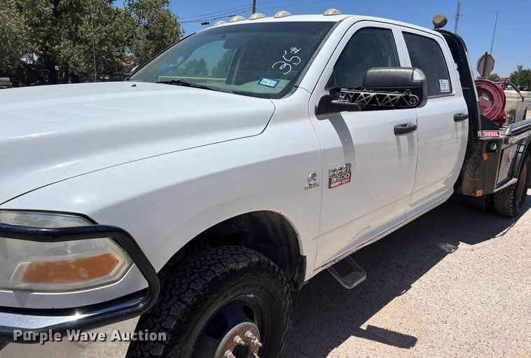 image for item DO2427 2012 Dodge Ram 3500HD Crew Cab flatbed pickup truck