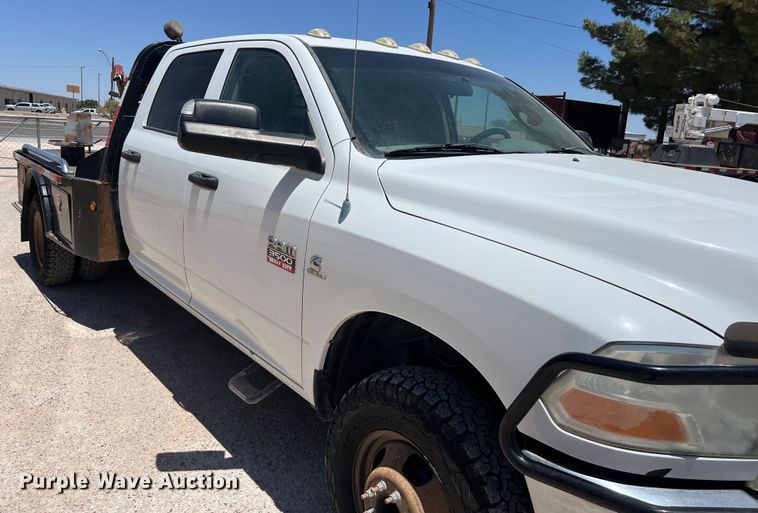 image for item DO2427 2012 Dodge Ram 3500HD Crew Cab flatbed pickup truck