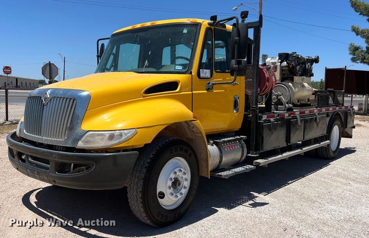 image for item DO2428 2013 International  DuraStar 4300 flatbed truck with crane