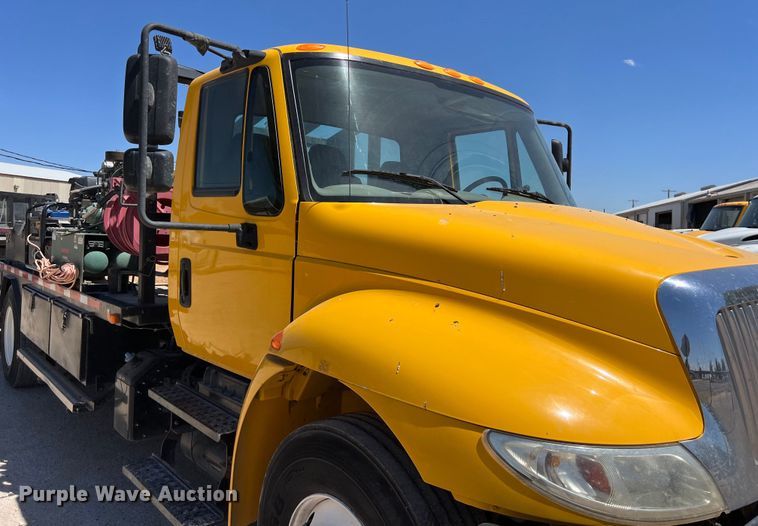 image for item DO2429 2018 International  DuraStar 4300 flatbed truck with crane