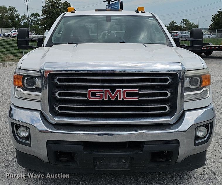 image for item DP1041 2015 GMC  Sierra 3500 Double Cab flatbed pickup truck