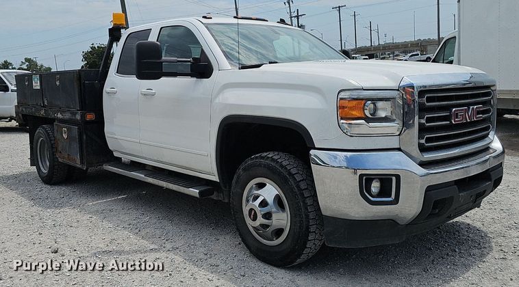 image for item DP1041 2015 GMC  Sierra 3500 Double Cab flatbed pickup truck