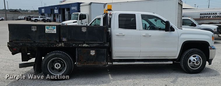 image for item DP1041 2015 GMC  Sierra 3500 Double Cab flatbed pickup truck