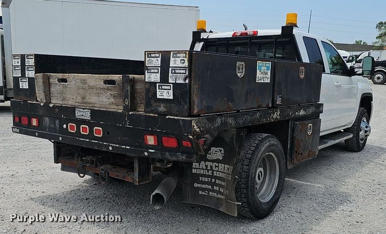 image for item DP1041 2015 GMC  Sierra 3500 Double Cab flatbed pickup truck