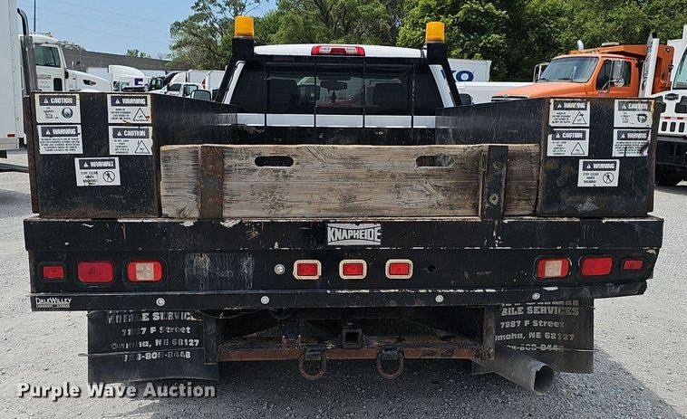 image for item DP1041 2015 GMC  Sierra 3500 Double Cab flatbed pickup truck