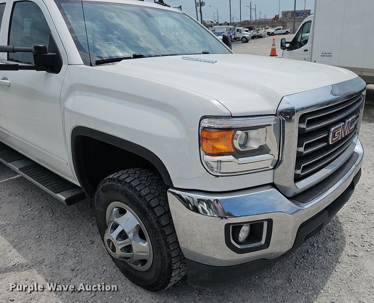 image for item DP1041 2015 GMC  Sierra 3500 Double Cab flatbed pickup truck