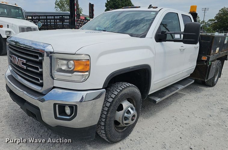 image for item DP1041 2015 GMC  Sierra 3500 Double Cab flatbed pickup truck