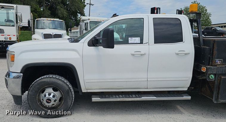 image for item DP1041 2015 GMC  Sierra 3500 Double Cab flatbed pickup truck