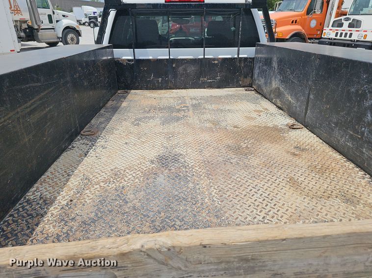 image for item DP1041 2015 GMC  Sierra 3500 Double Cab flatbed pickup truck