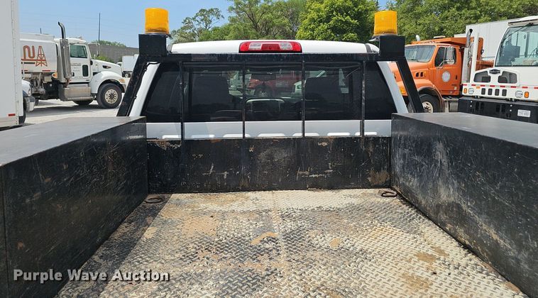 image for item DP1041 2015 GMC  Sierra 3500 Double Cab flatbed pickup truck