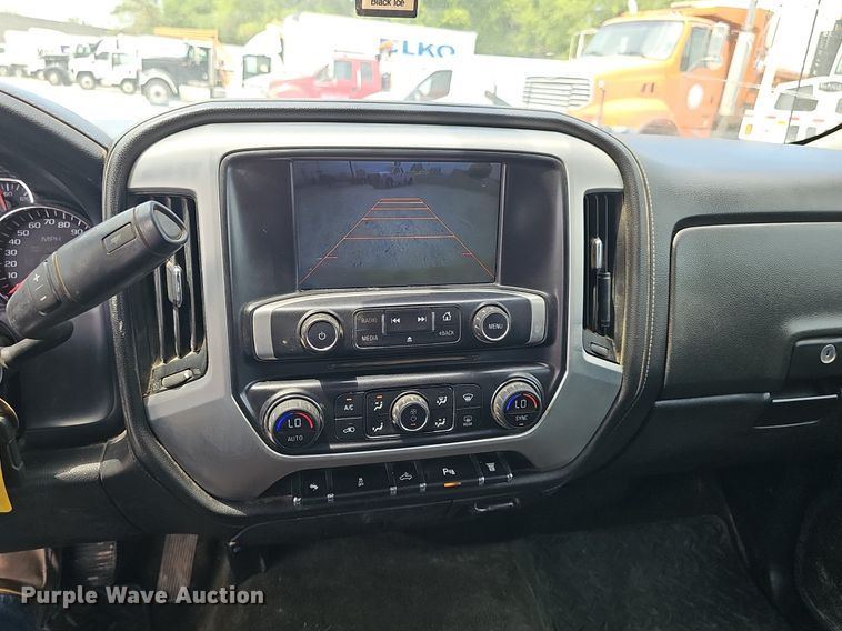 image for item DP1041 2015 GMC  Sierra 3500 Double Cab flatbed pickup truck