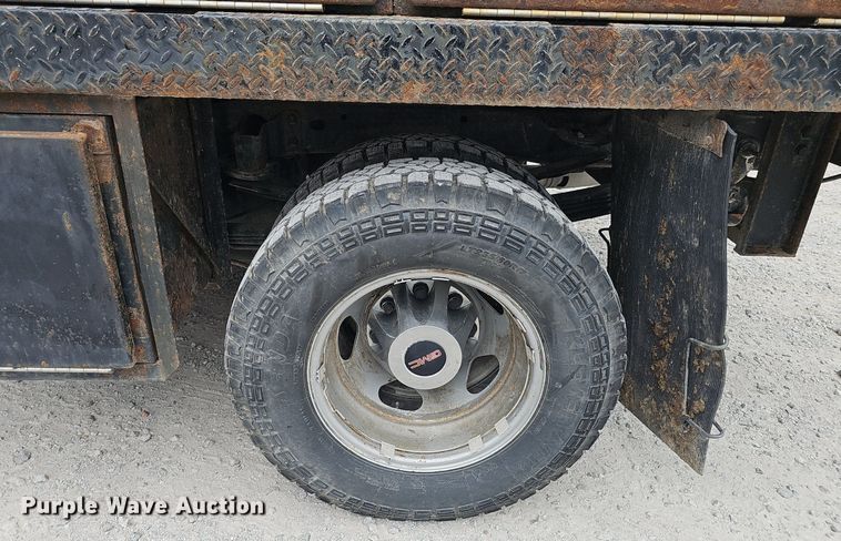 image for item DP1041 2015 GMC  Sierra 3500 Double Cab flatbed pickup truck