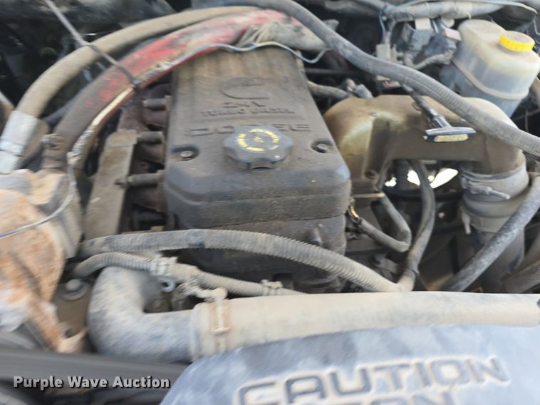 image for item DQ4416 2004 Dodge  Ram 3500 Quad Cab bale bed pickup truck