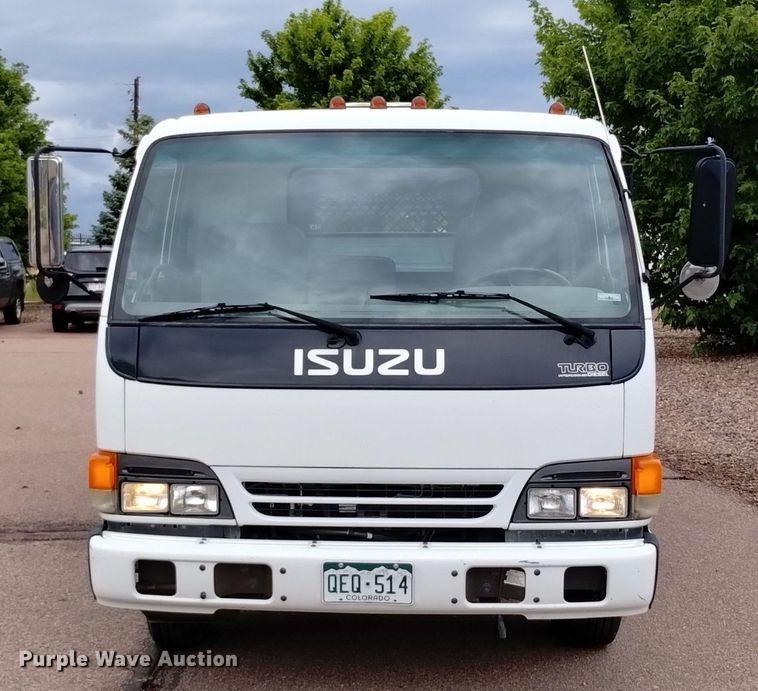 image for item DQ6165 2002 Isuzu  NPR HD flatbed truck