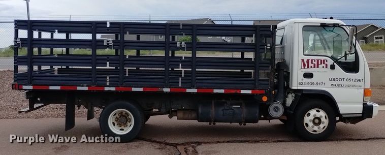 image for item DQ6165 2002 Isuzu  NPR HD flatbed truck