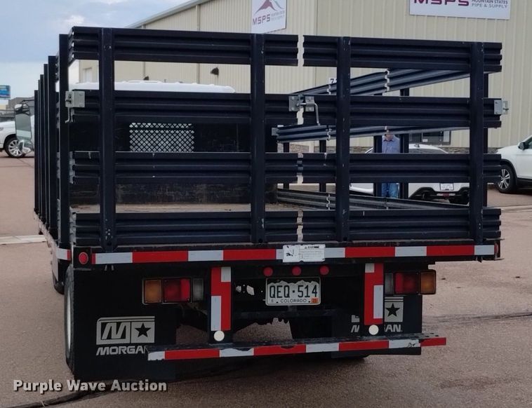 image for item DQ6165 2002 Isuzu  NPR HD flatbed truck