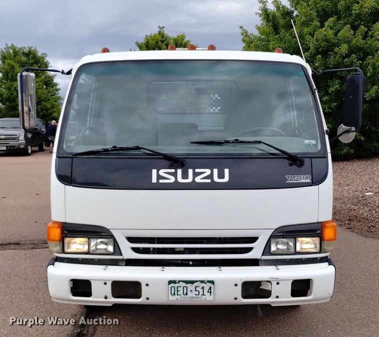 image for item DQ6165 2002 Isuzu  NPR HD flatbed truck