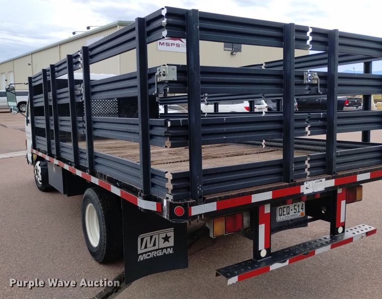 image for item DQ6165 2002 Isuzu  NPR HD flatbed truck