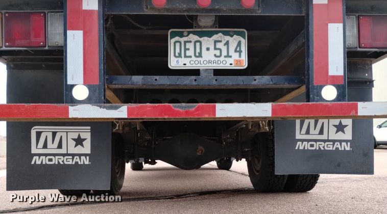 image for item DQ6165 2002 Isuzu  NPR HD flatbed truck