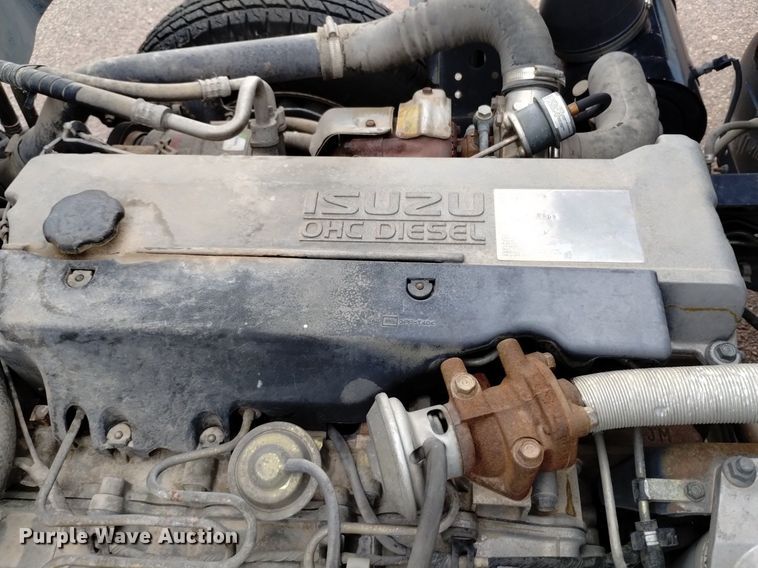 image for item DQ6165 2002 Isuzu  NPR HD flatbed truck